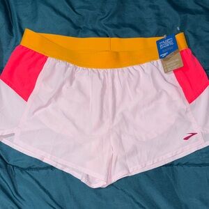 Brooks ChaserWomen's Light Pink Running Shorts w/ Golden Waistband & Pink sides